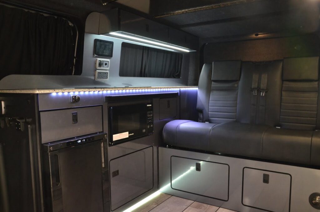 Ford conversion, campervan UK, ford campervan, high roof campervan, high roof van conversion, high roof van modified, campervans uk, van conversion uk, van conversion with shower, van conversion with bathroom, campervan build, rock n roll bed campervan