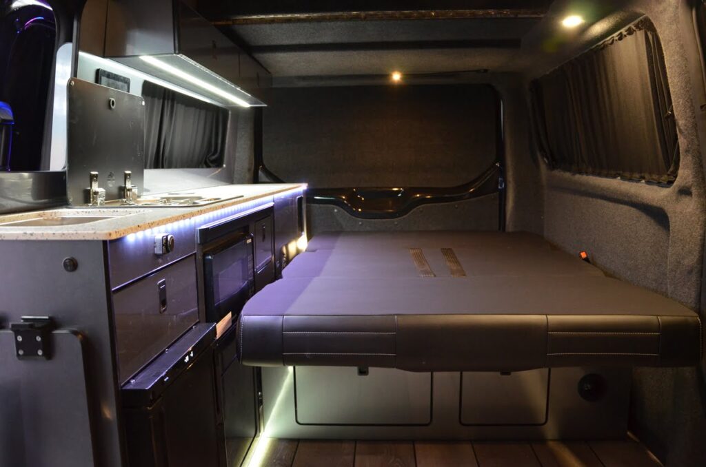 Ford conversion, campervan UK, ford campervan, high roof campervan, high roof van conversion, high roof van modified, campervans uk, van conversion uk, van conversion with shower, van conversion with bathroom, campervan build, rock n roll bed campervan